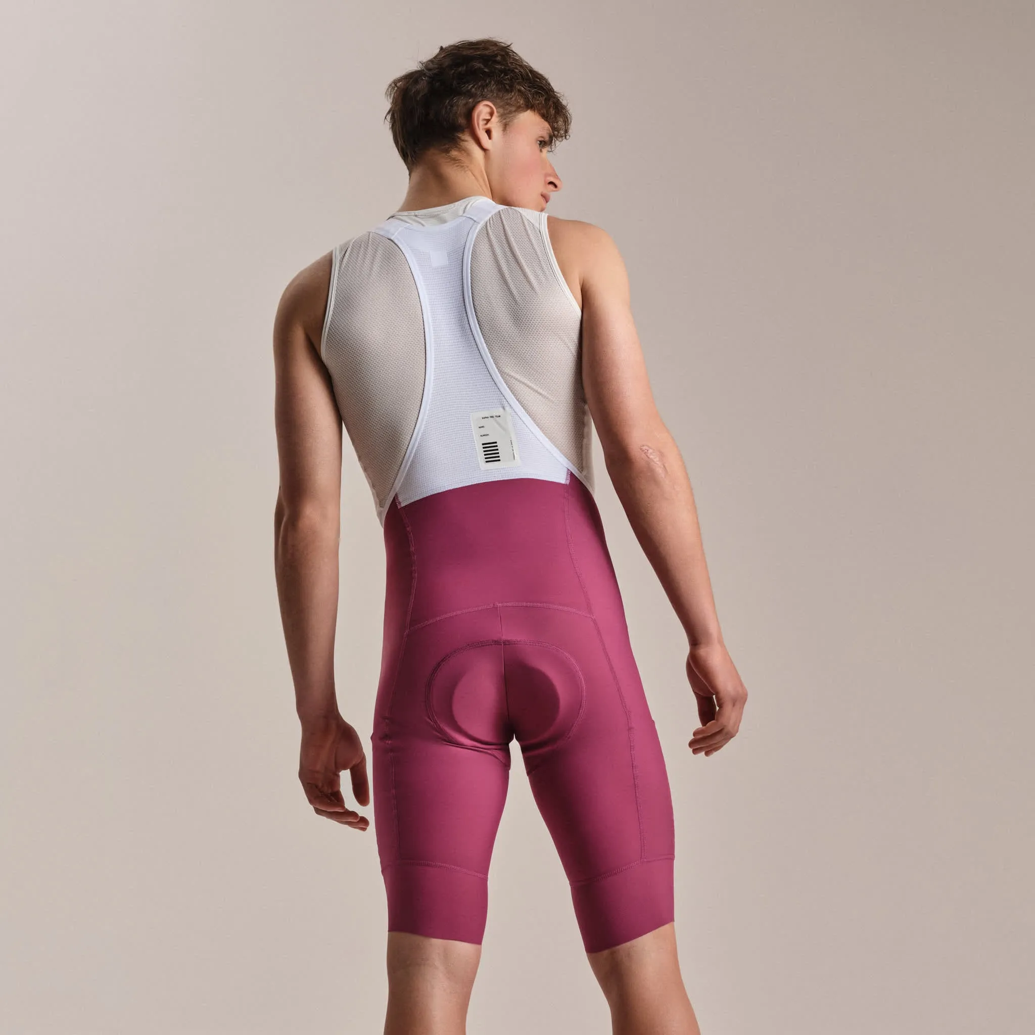 RAPHA Pro Team Cargo Bib Shorts Long - RAW Raspberry/White - Image 4